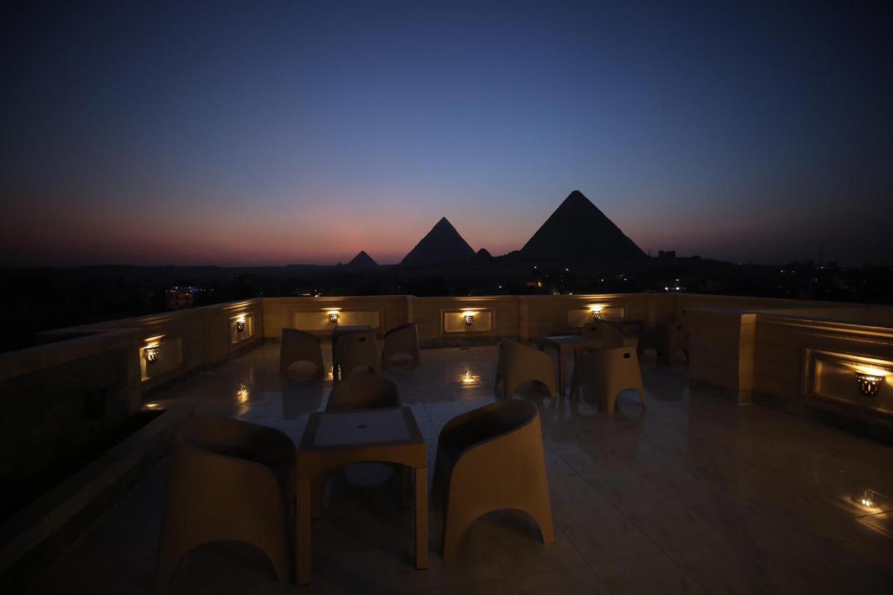 ホテル Hussien Lotus Pyramids View カイロ エクステリア 写真