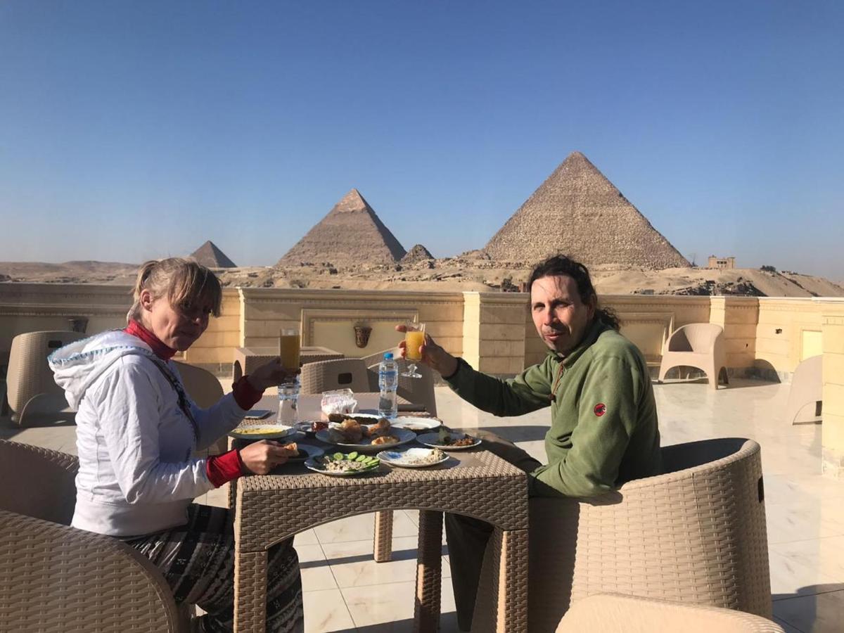 ホテル Hussien Lotus Pyramids View カイロ エクステリア 写真